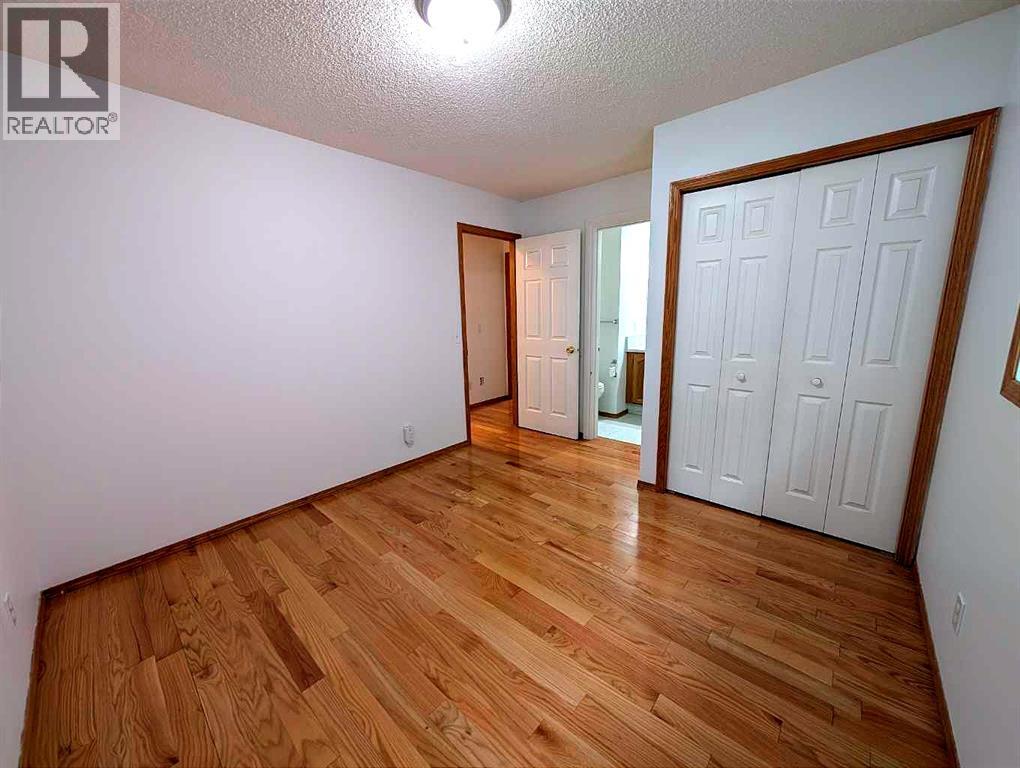 151 Taracove Estate Drive NE, Calgary, Alberta  T3J 4R1 - Photo 12 - A2325112
