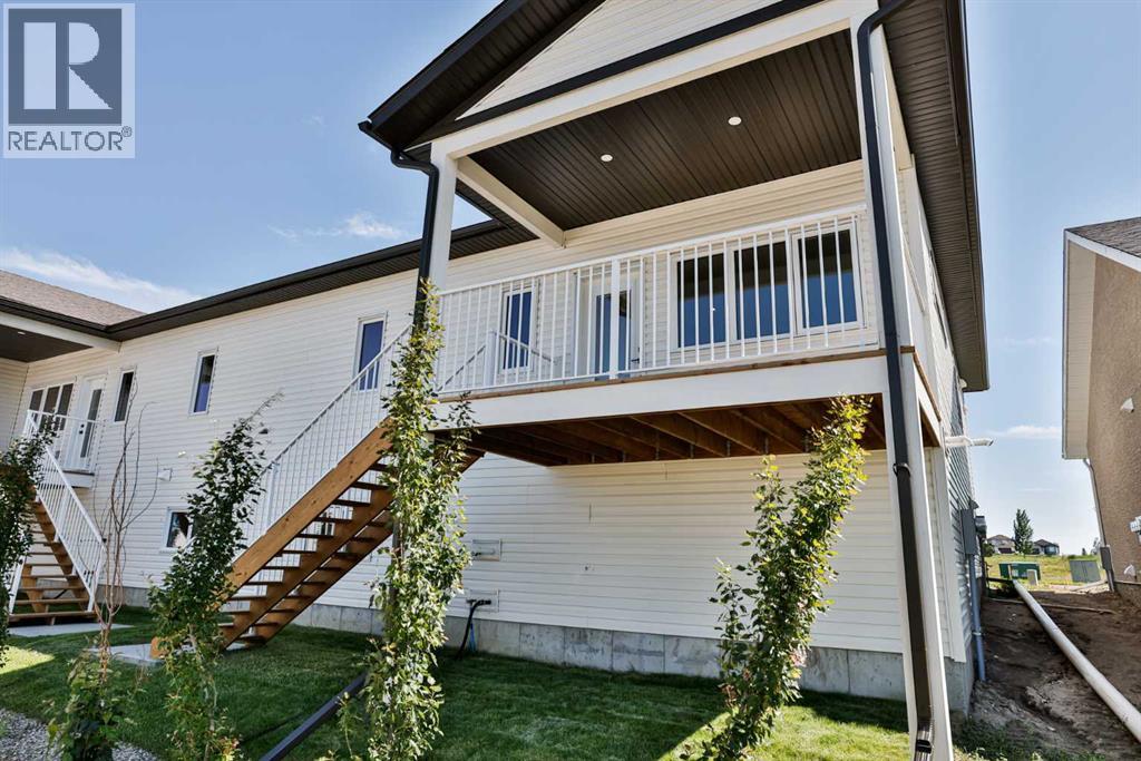 423 Meadowlark Way, Vulcan, Alberta  T0L 2B0 - Photo 2 - A2253580