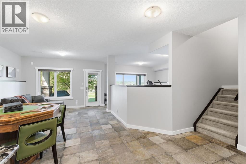 209 Jumping Pound Terrace, Cochrane, Alberta  T4C 0K5 - Photo 38 - A2326986