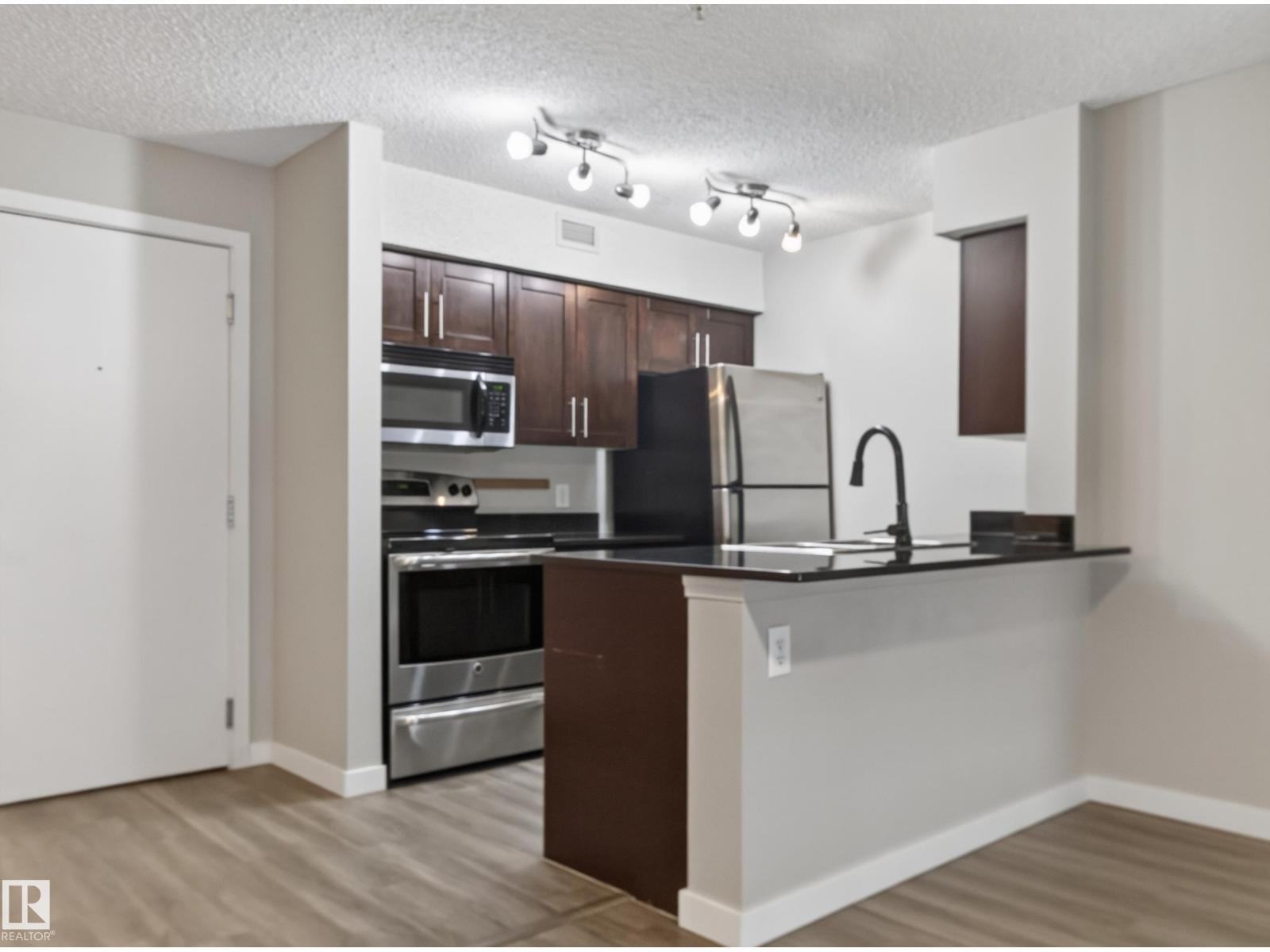 #211 1080 Mcconachie Bv NW, Edmonton, Alberta  T5Y 0X2 - Photo 5 - E4497719