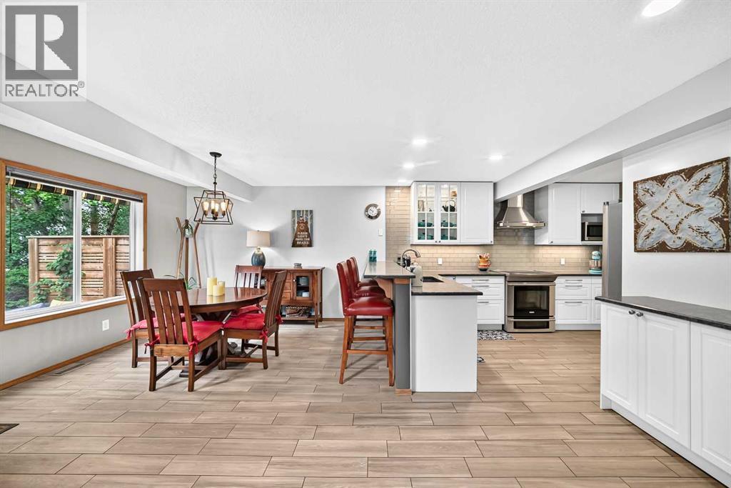 7919 Cougar Ridge Avenue SW, Calgary, Alberta  T3H 5L4 - Photo 11 - A2326820