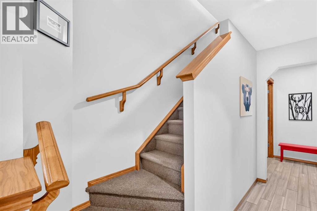 7919 Cougar Ridge Avenue SW, Calgary, Alberta  T3H 5L4 - Photo 25 - A2326820