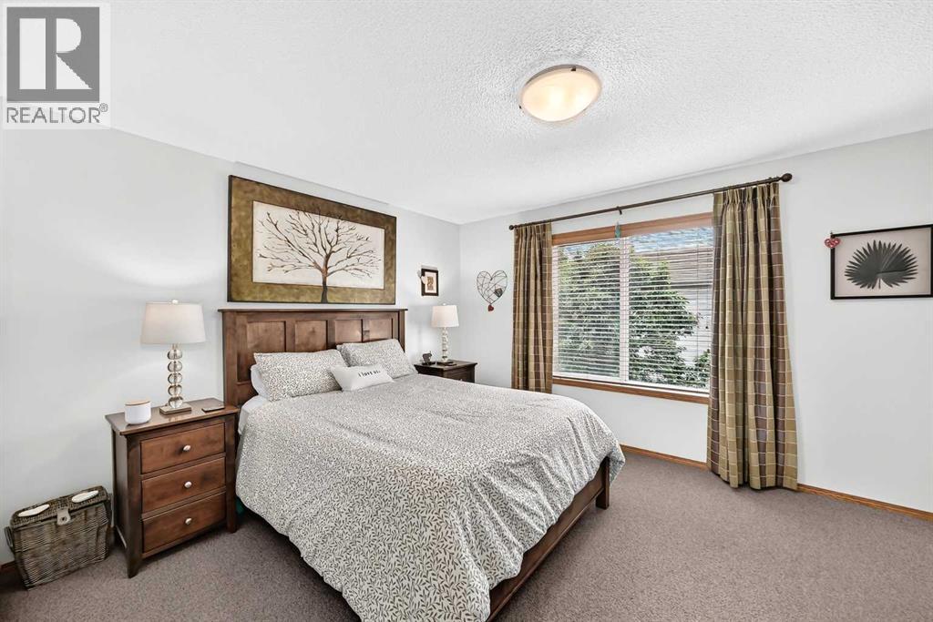 7919 Cougar Ridge Avenue SW, Calgary, Alberta  T3H 5L4 - Photo 26 - A2326820