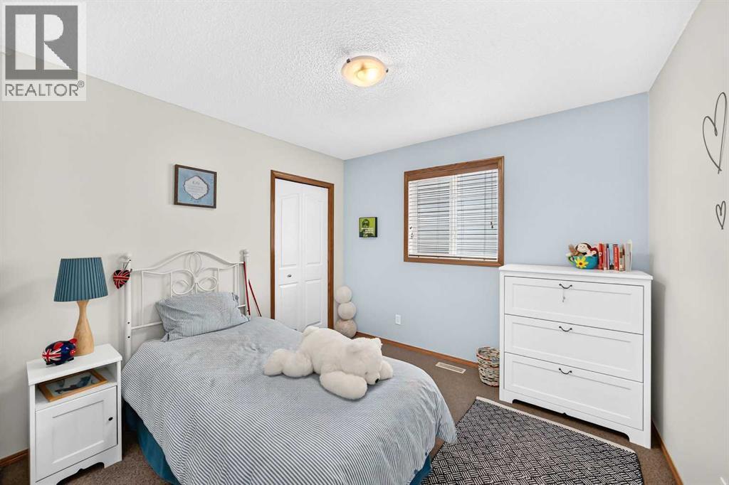 7919 Cougar Ridge Avenue SW, Calgary, Alberta  T3H 5L4 - Photo 34 - A2326820