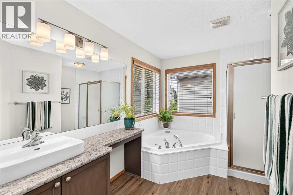 7919 Cougar Ridge Avenue SW, Calgary, Alberta  T3H 5L4 - Photo 30 - A2326820