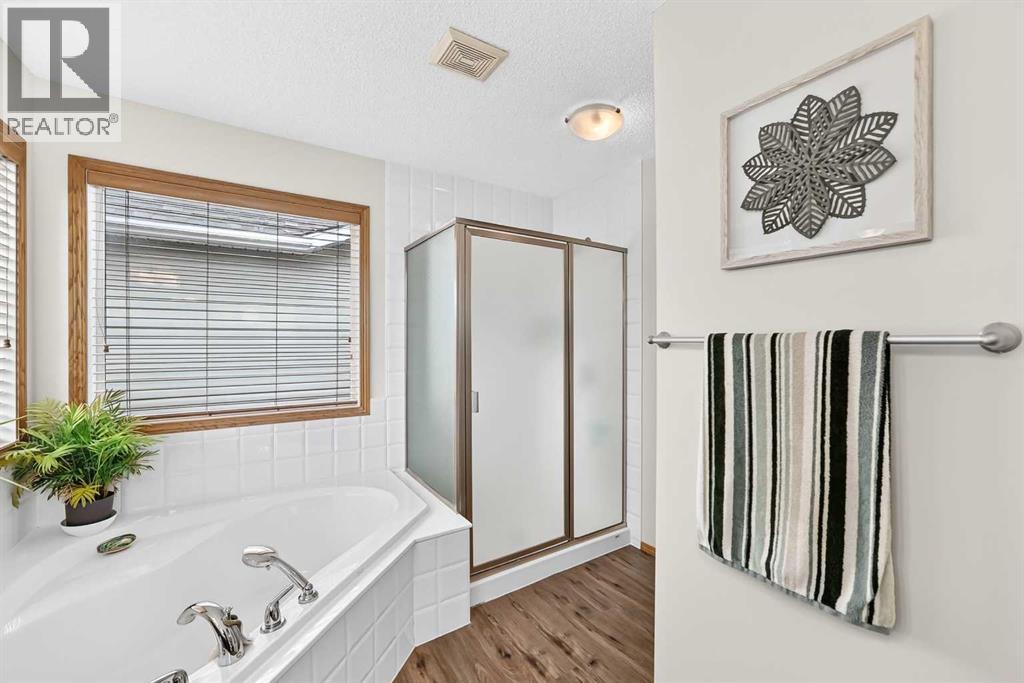 7919 Cougar Ridge Avenue SW, Calgary, Alberta  T3H 5L4 - Photo 32 - A2326820