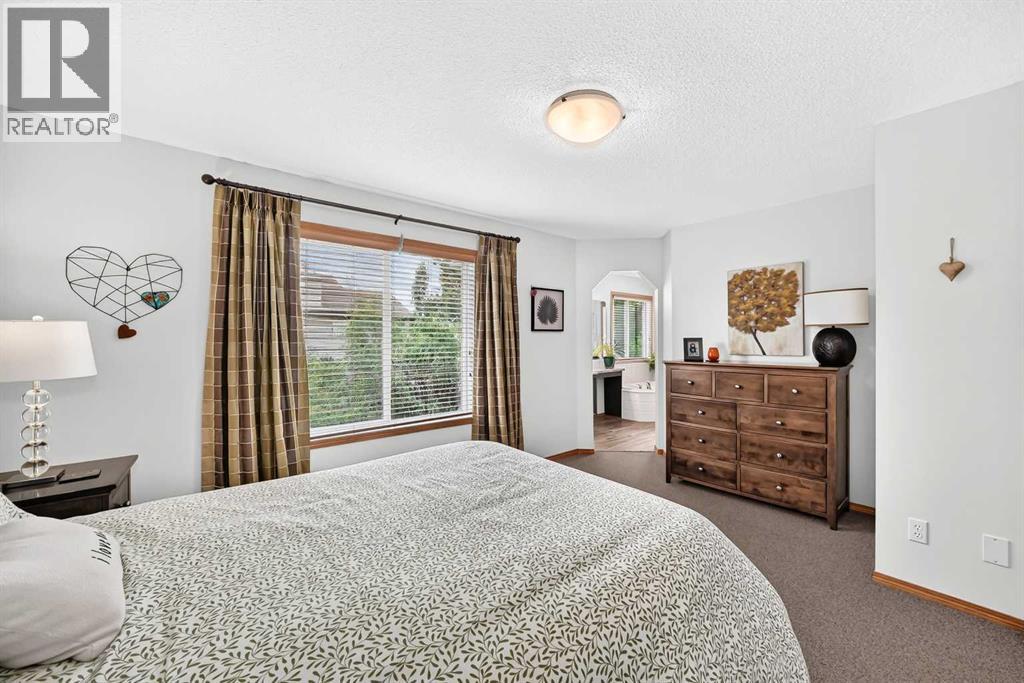 7919 Cougar Ridge Avenue SW, Calgary, Alberta  T3H 5L4 - Photo 29 - A2326820
