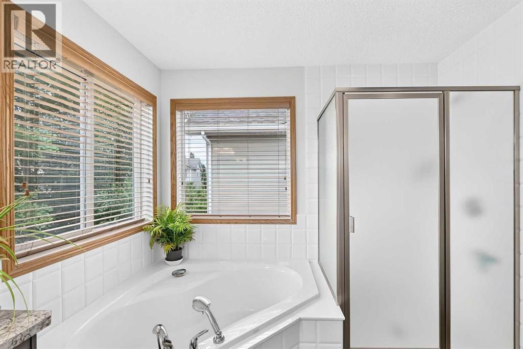 7919 Cougar Ridge Avenue SW, Calgary, Alberta  T3H 5L4 - Photo 33 - A2326820