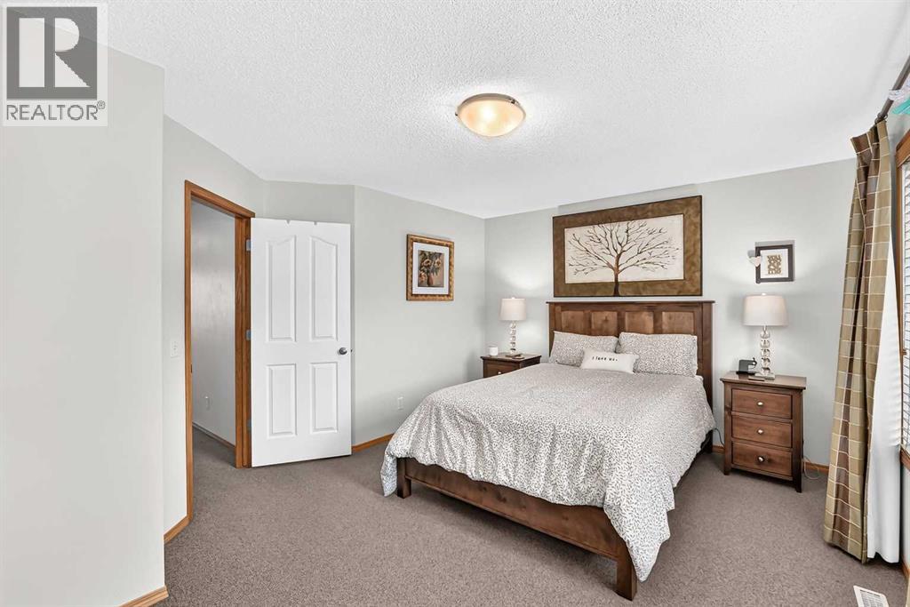 7919 Cougar Ridge Avenue SW, Calgary, Alberta  T3H 5L4 - Photo 27 - A2326820