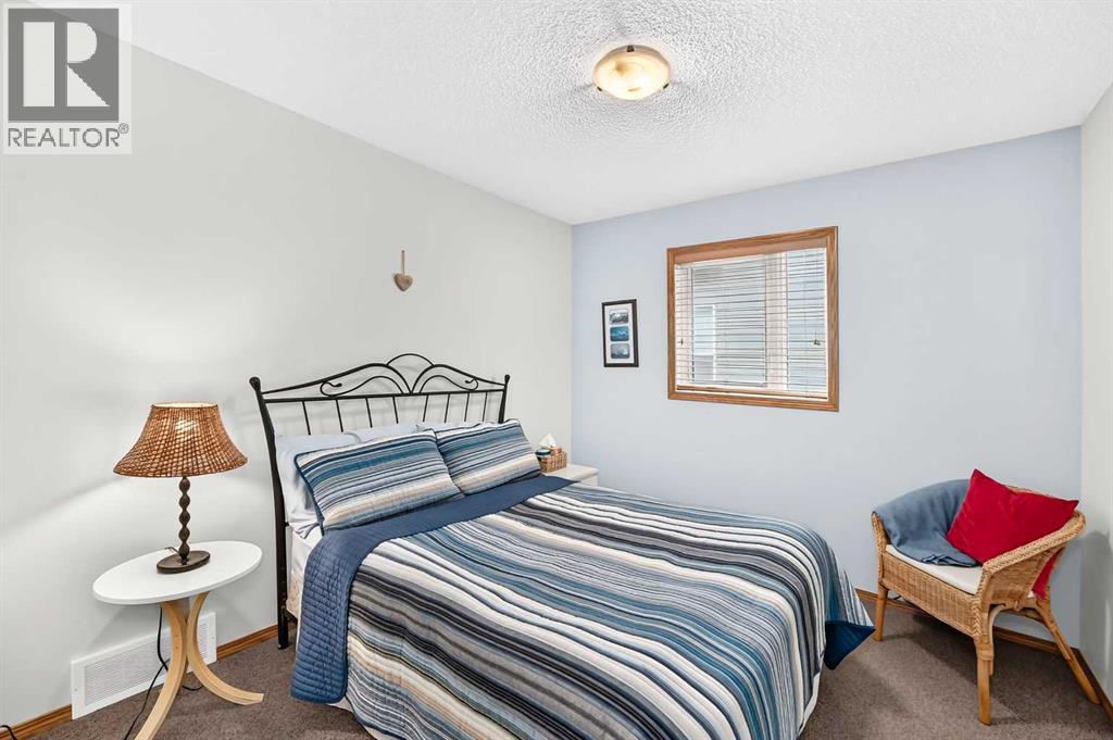 7919 Cougar Ridge Avenue SW, Calgary, Alberta  T3H 5L4 - Photo 36 - A2326820
