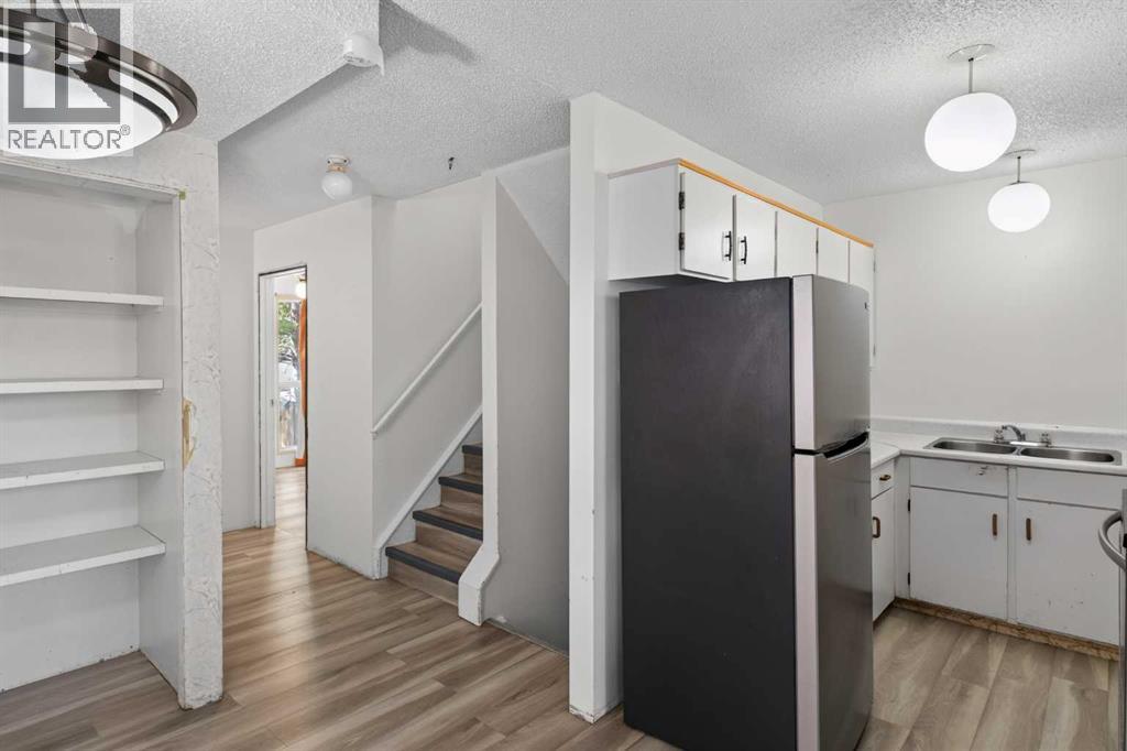 558 Whitehill Place NE, Calgary, Alberta  T1Y 3G8 - Photo 2 - A2327723