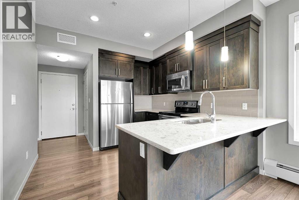 305, 6703 New Brighton Avenue SE, Calgary, Alberta  T2Z 5C8 - Photo 4 - A2326326