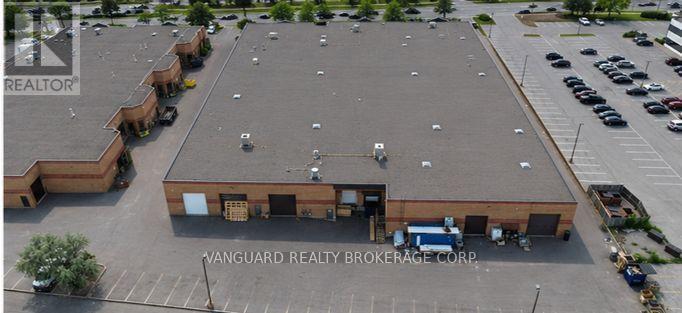 2 - 633 Edgeley Boulevard, Vaughan, Ontario  L4K 4H6 - Photo 3 - N12920950