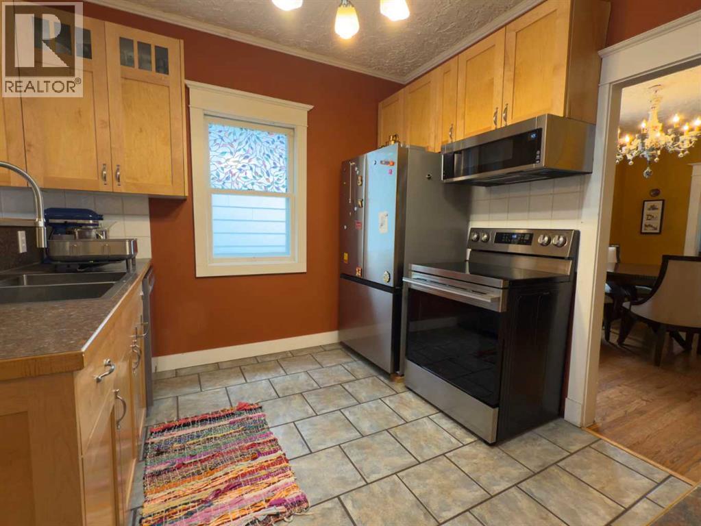 1126 19 Avenue NW, Calgary, Alberta  T2M 1A1 - Photo 11 - A2325751