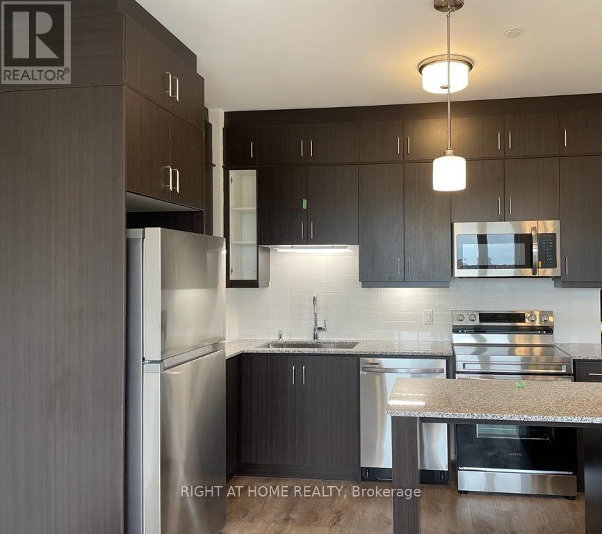 201 - 3265 Carding Mill Trail, Oakville, Ontario L6M 5P7 - Photo 4 - W13542360