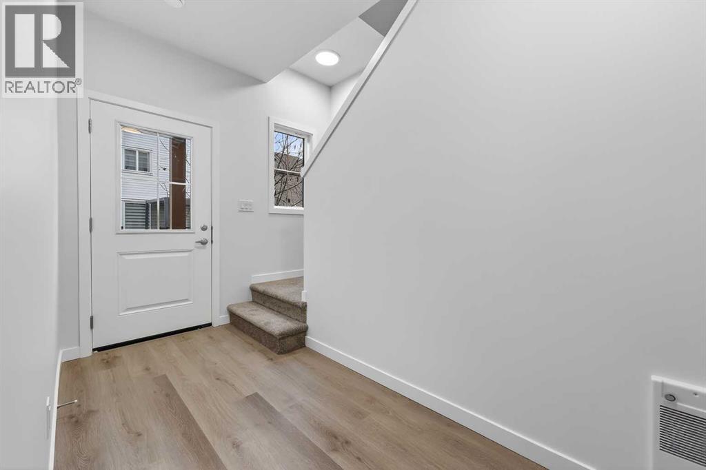106, 40 Creekside Way SW, Calgary, Alberta  T2X 6E2 - Photo 3 - A2317422