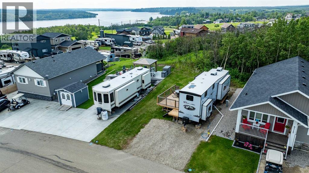 6112, 25054 South Pine Lake Road, Rural Red Deer County, Alberta  T0M 1S0 - Photo 1 - A2326184