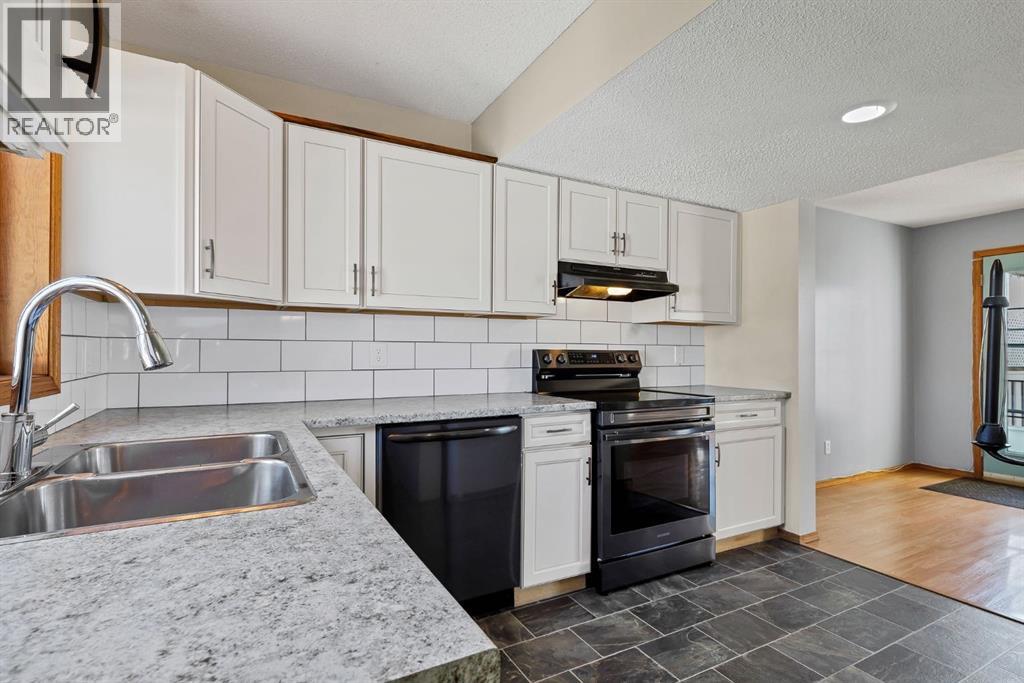 98 Everglade Drive SE, Airdrie, Alberta  T4B 2E8 - Photo 6 - A2325519