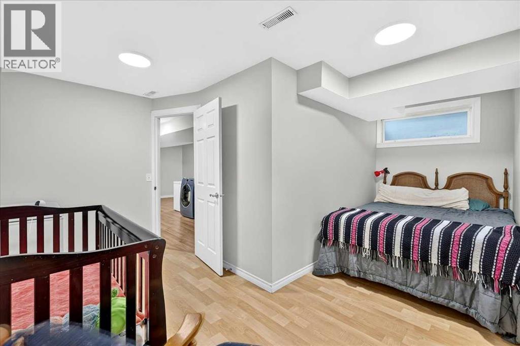 39 Bridlewood Avenue SW, Calgary, Alberta  T2Y 3T3 - Photo 33 - A2323974