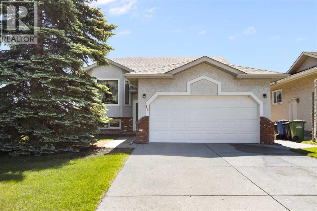 18 West Park Place, Cochrane, Alberta  T4C 1J7 - Photo 1 - A2326015