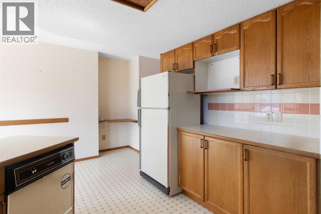 18 West Park Place, Cochrane, Alberta  T4C 1J7 - Photo 9 - A2326015