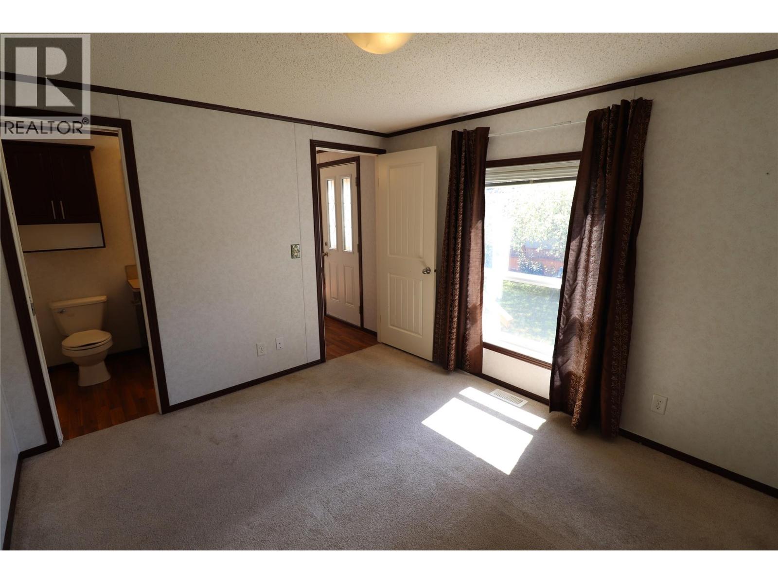 500 16th Avenue Unit# 57, Genelle, British Columbia  V0G 1G0 - Photo 22 - 10394301