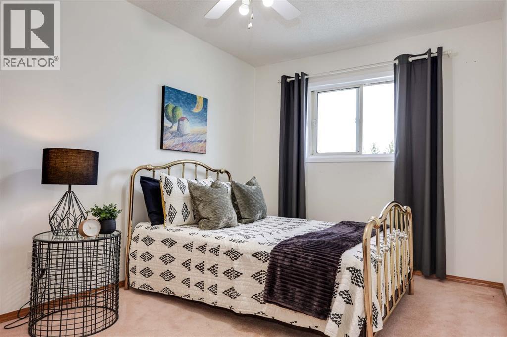 23 Sandalwood Close NW, Calgary, Alberta  T3K 4B4 - Photo 17 - A2327987