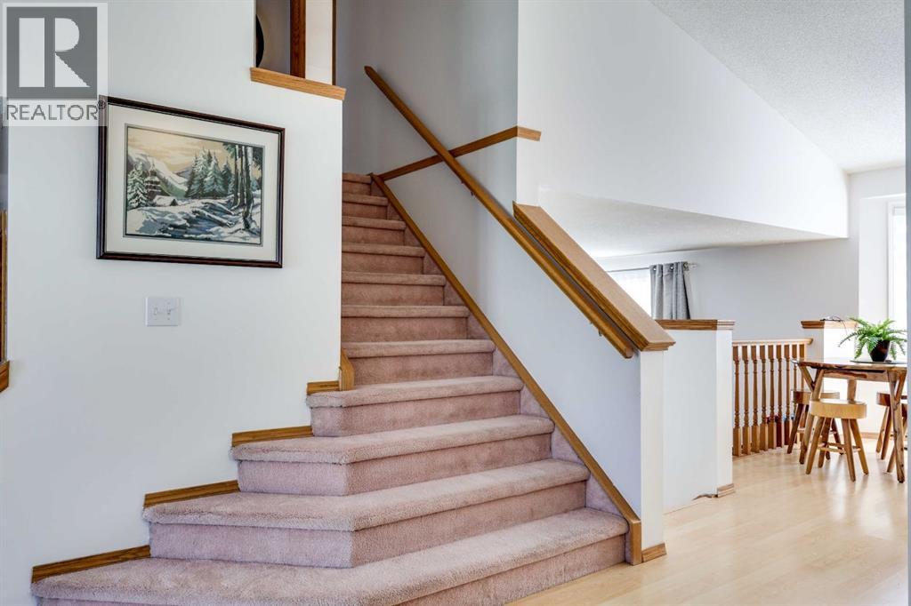 23 Sandalwood Close NW, Calgary, Alberta  T3K 4B4 - Photo 20 - A2327987