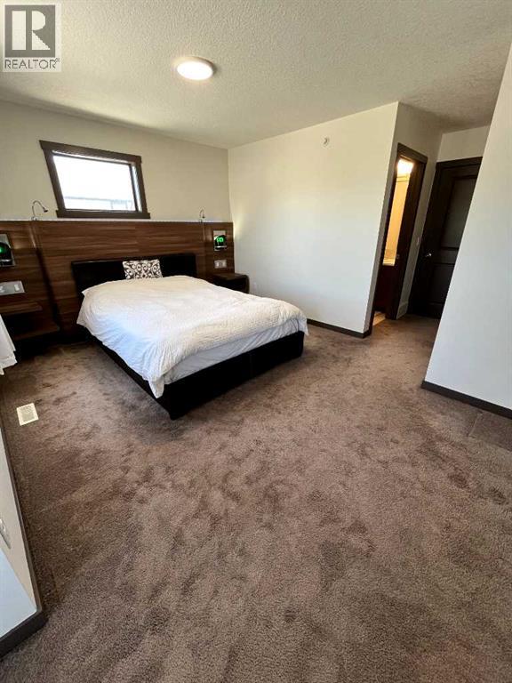 5 Covecreek Mews NE, Calgary, Alberta  T3K 0V8 - Photo 20 - A2324736