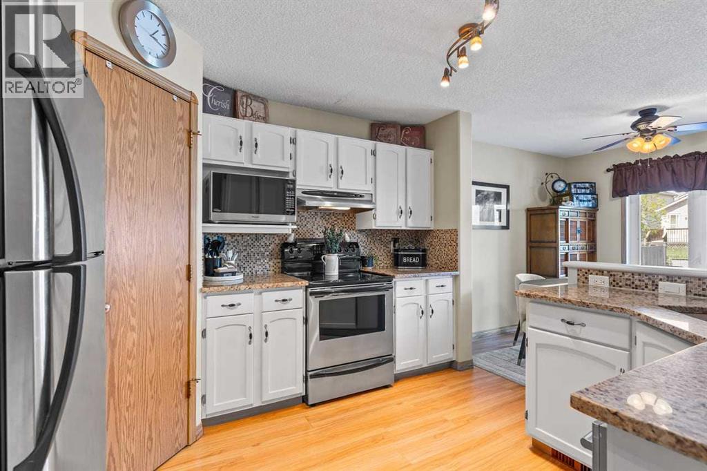 158 Saratoga Close NE, Calgary, Alberta  T1Y 7A1 - Photo 4 - A2325976
