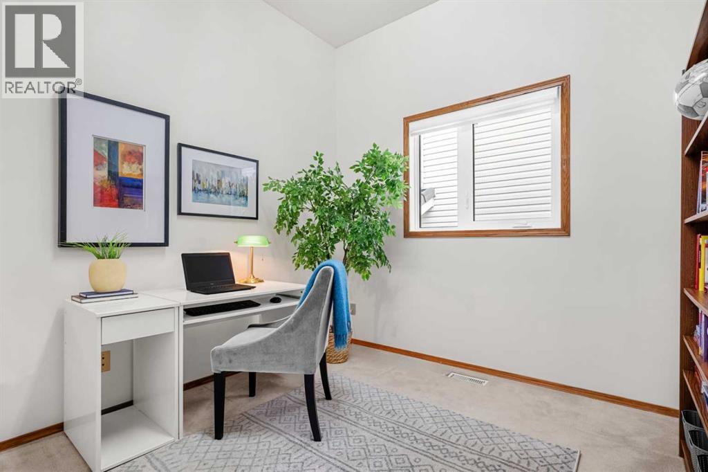 125 Woodpark Close SW, Calgary, Alberta  T2W 6H1 - Photo 22 - A2324937