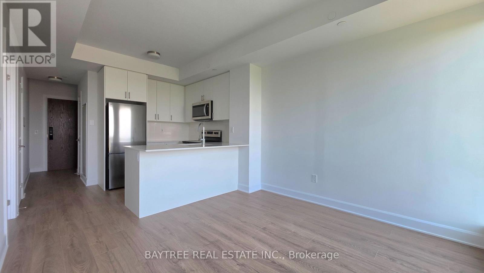 1406 - 3240 William Coltson Avenue, Oakville, Ontario  L6H 8C8 - Photo 3 - W13550604
