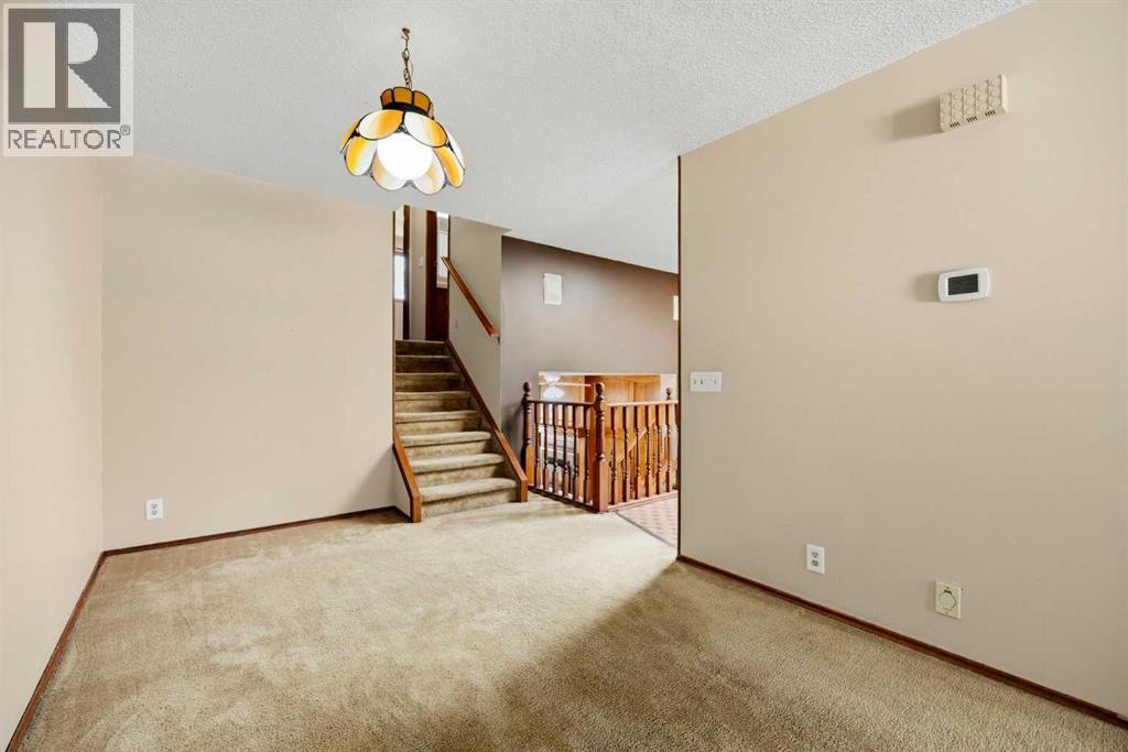 80 Macewan Drive NW, Calgary, Alberta  T3K 2P7 - Photo 10 - A2325610