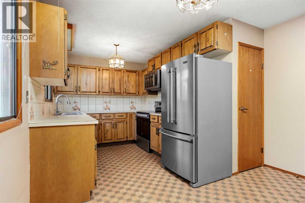 80 Macewan Drive NW, Calgary, Alberta  T3K 2P7 - Photo 13 - A2325610