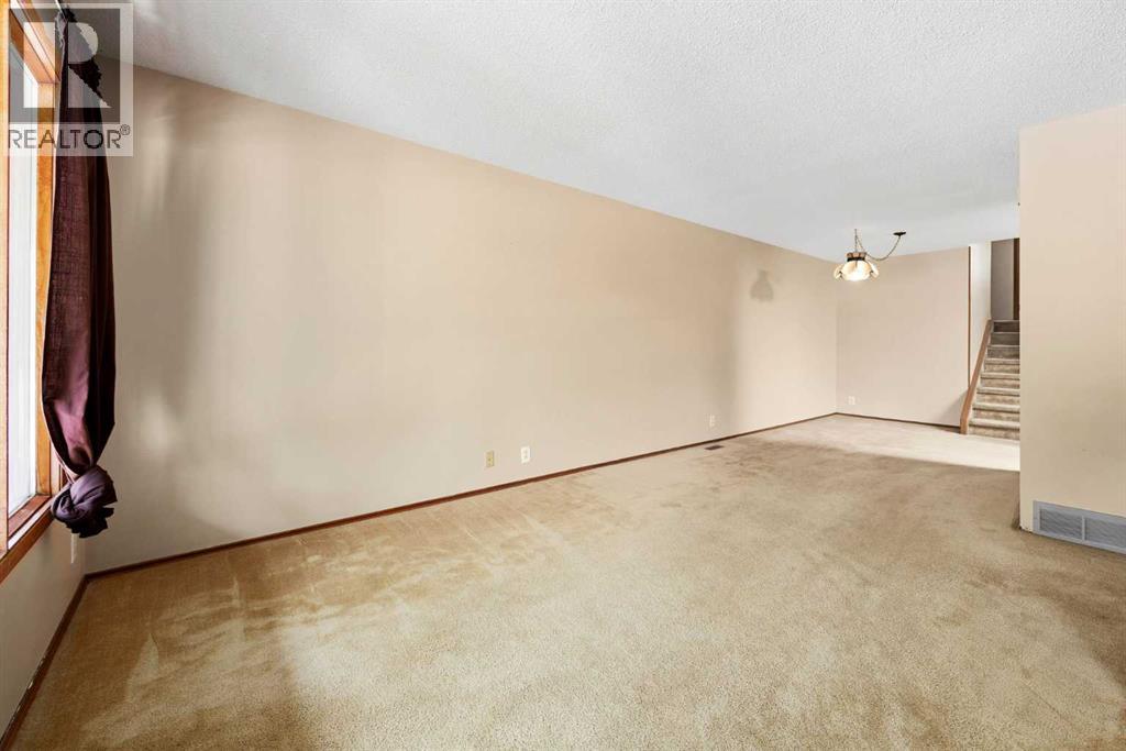80 Macewan Drive NW, Calgary, Alberta  T3K 2P7 - Photo 6 - A2325610