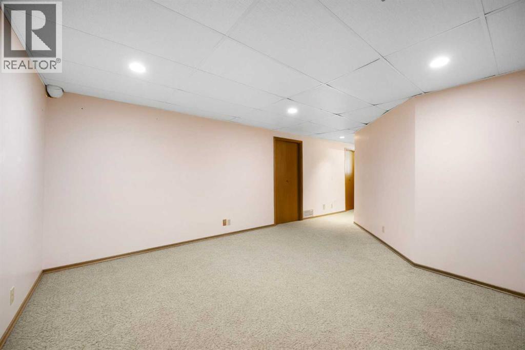 80 Macewan Drive NW, Calgary, Alberta  T3K 2P7 - Photo 34 - A2325610