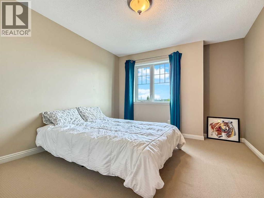 44 Mike Ralph Way SW, Calgary, Alberta  T3E 0H8 - Photo 21 - A2324651