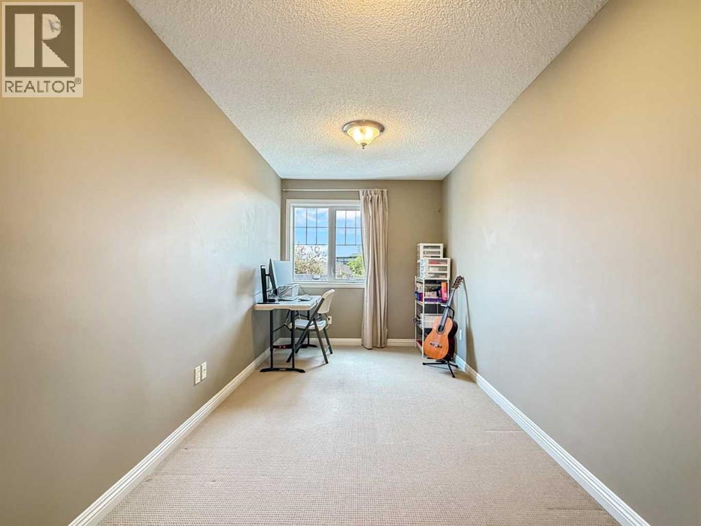 44 Mike Ralph Way SW, Calgary, Alberta  T3E 0H8 - Photo 23 - A2324651