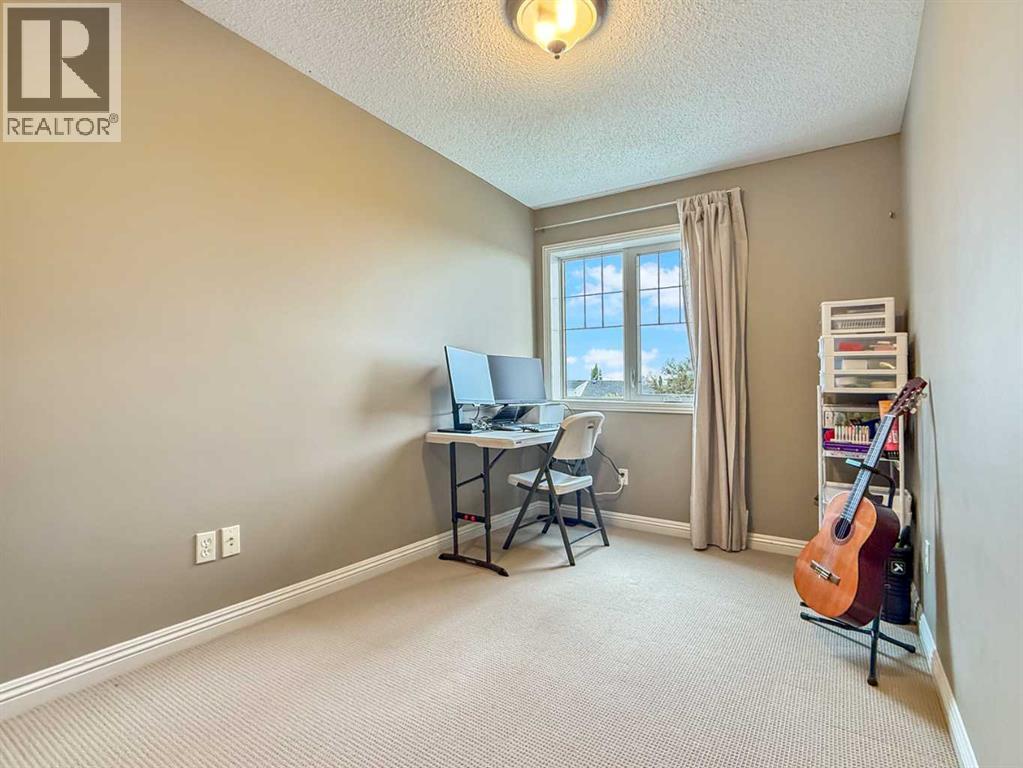 44 Mike Ralph Way SW, Calgary, Alberta  T3E 0H8 - Photo 22 - A2324651