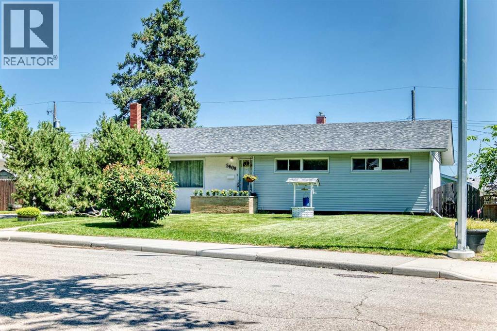 5608 Buckthorn Road NW, Calgary, Alberta  T2K 2Y5 - Photo 2 - A2327474