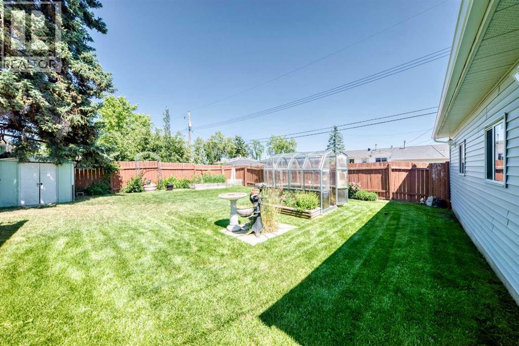 5608 Buckthorn Road NW, Calgary, Alberta  T2K 2Y5 - Photo 43 - A2327474