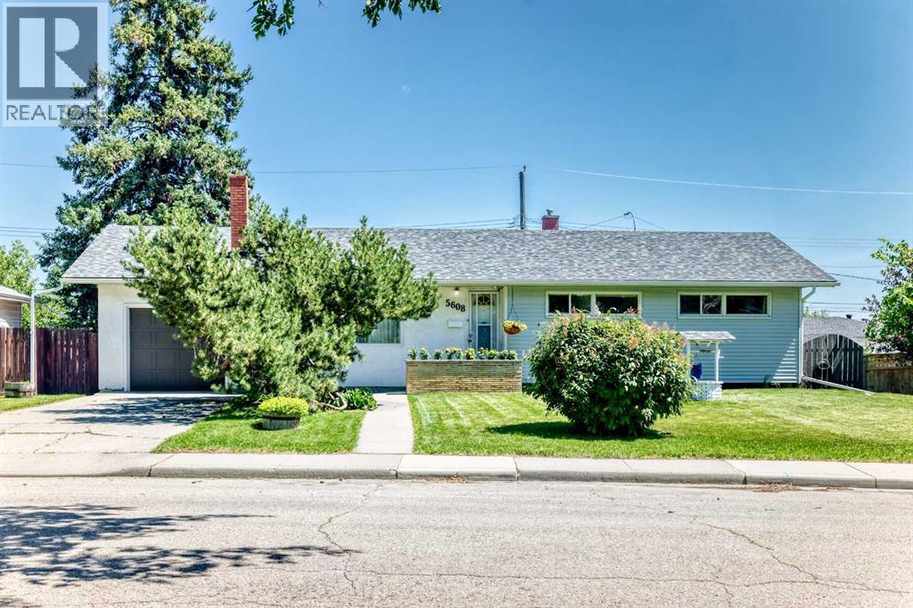 5608 Buckthorn Road NW, Calgary, Alberta  T2K 2Y5 - Photo 1 - A2327474