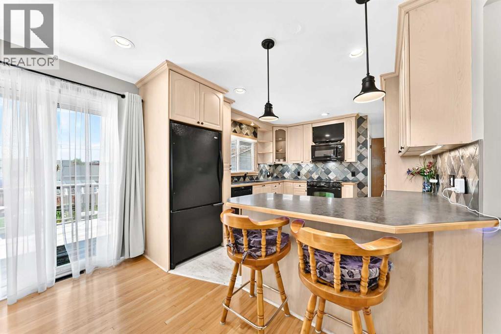 5608 Buckthorn Road NW, Calgary, Alberta  T2K 2Y5 - Photo 11 - A2327474