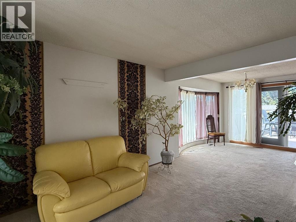 6803 Dalmeny Gate NW, Calgary, Alberta  T3A 1T5 - Photo 4 - A2312479