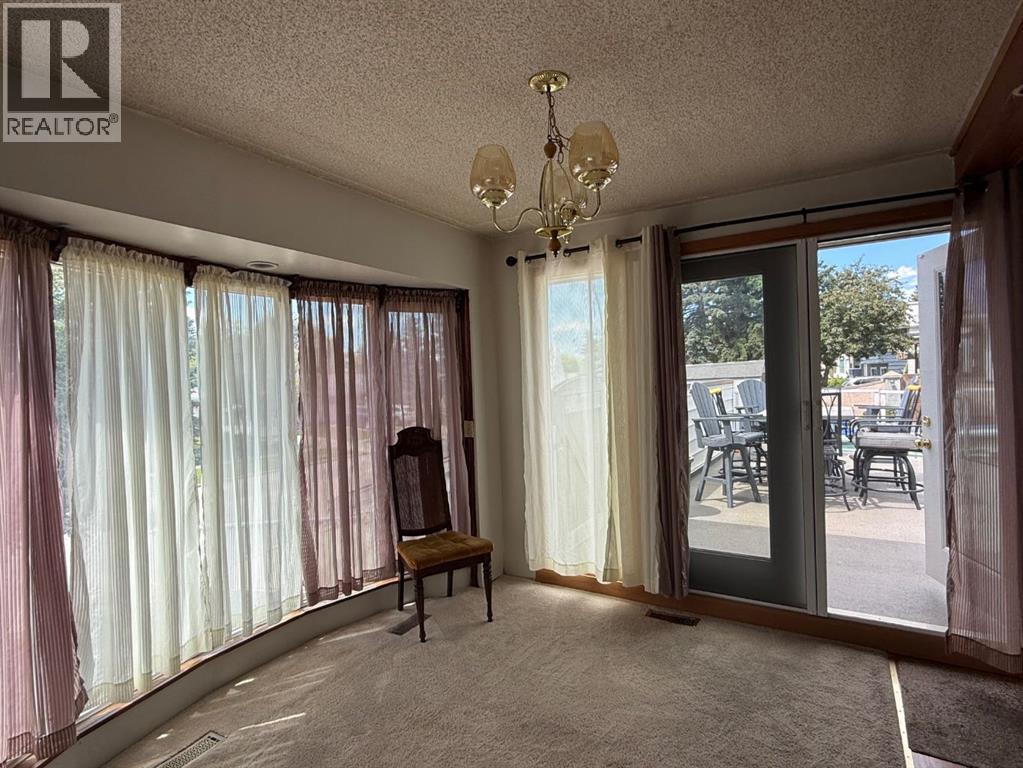 6803 Dalmeny Gate NW, Calgary, Alberta  T3A 1T5 - Photo 5 - A2312479