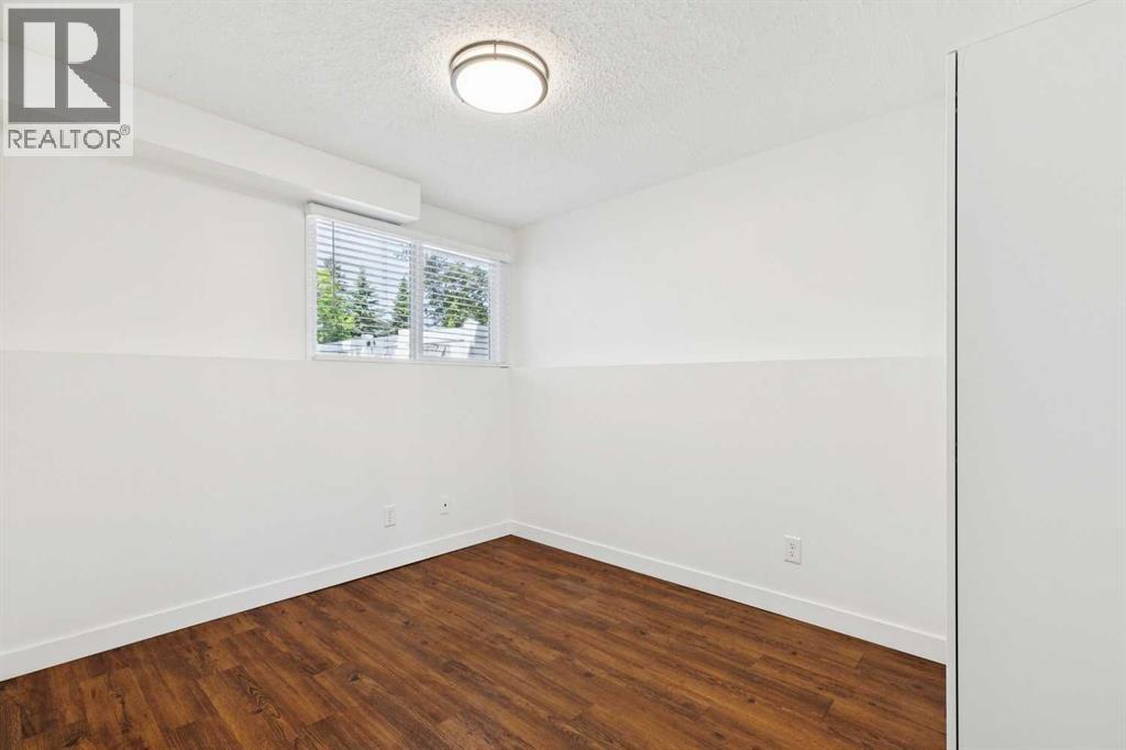 11424 8 Street SW, Calgary, Alberta  T2W 4J5 - Photo 14 - A2328216