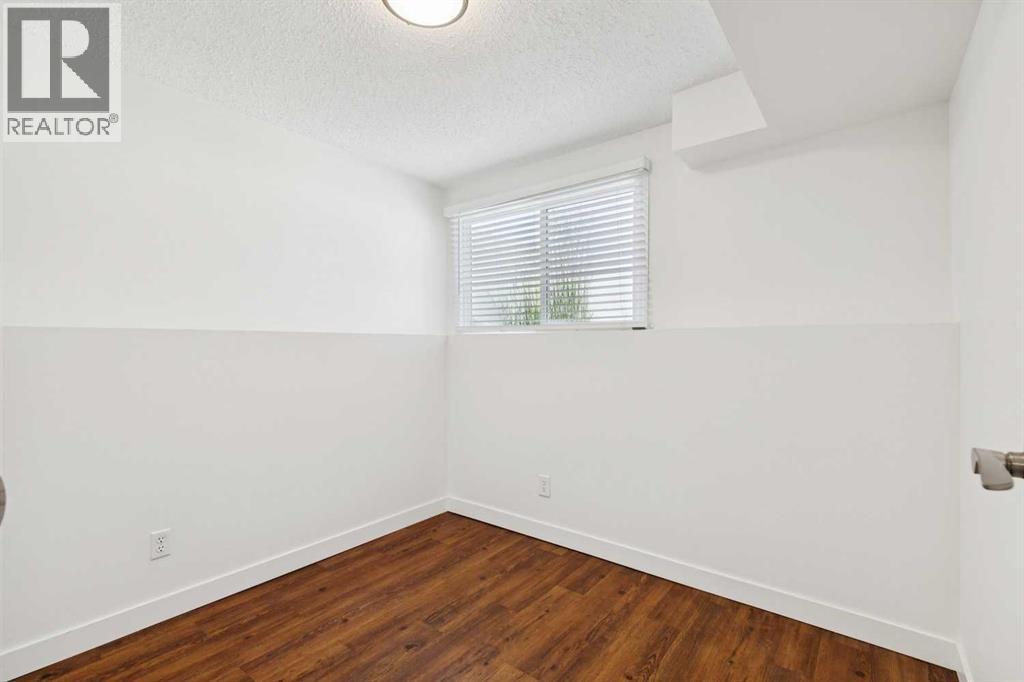 11424 8 Street SW, Calgary, Alberta  T2W 4J5 - Photo 15 - A2328216