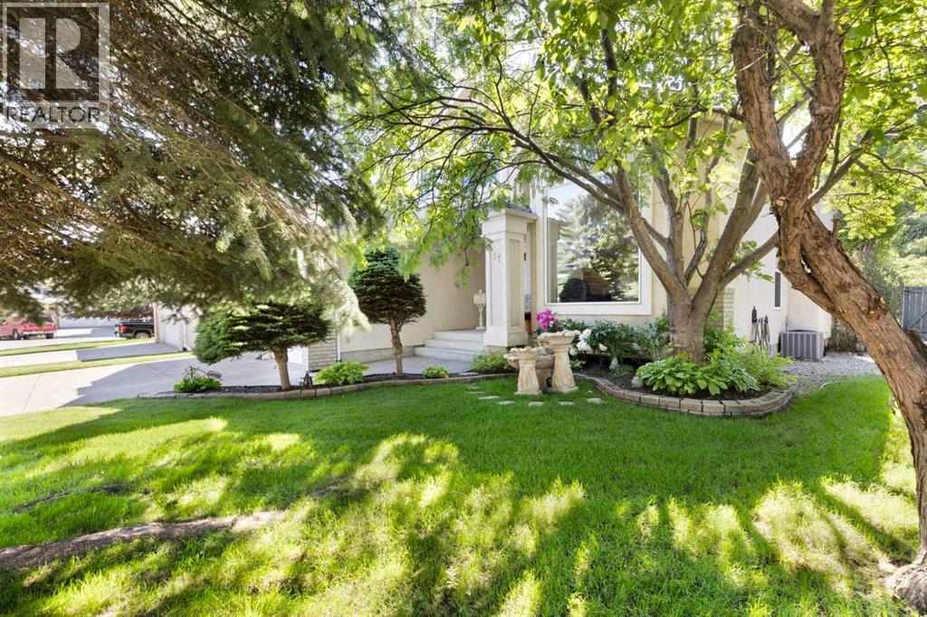 51 Mckenzie Lake Crescent SE, Calgary, Alberta  T2Z 2P1 - Photo 2 - A2328096