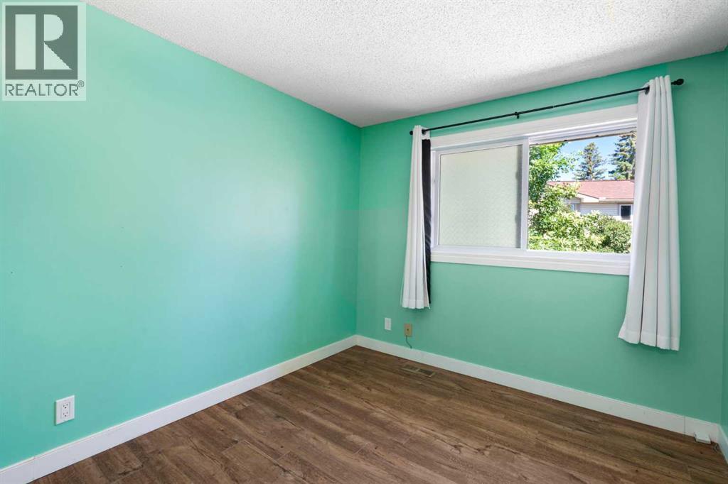 191 Woodmont Terrace SW, Calgary, Alberta  T2W 3K3 - Photo 20 - A2321912