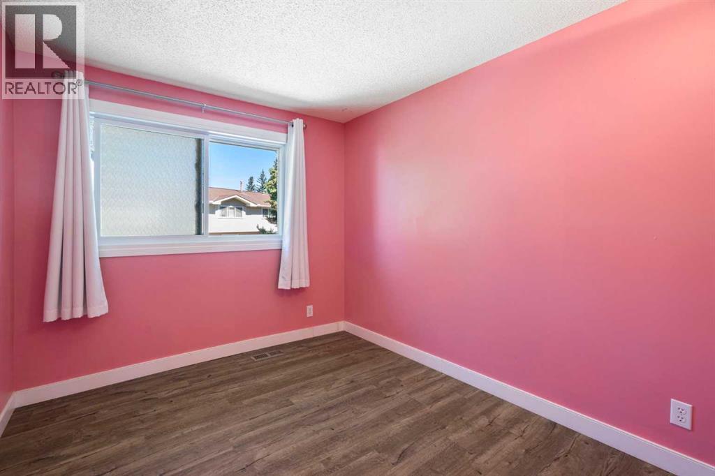 191 Woodmont Terrace SW, Calgary, Alberta  T2W 3K3 - Photo 18 - A2321912
